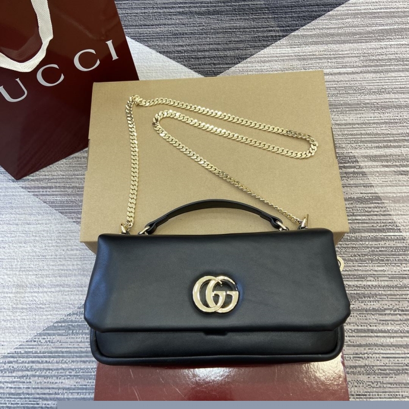 G*u*i top handle bags